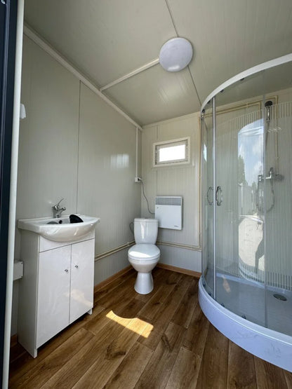 Cabine sanitaire double 4,00 × 2,00 m – avec douche et réservoir